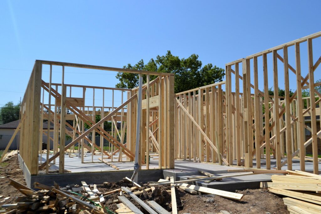 Frame of newly constructed house being built.